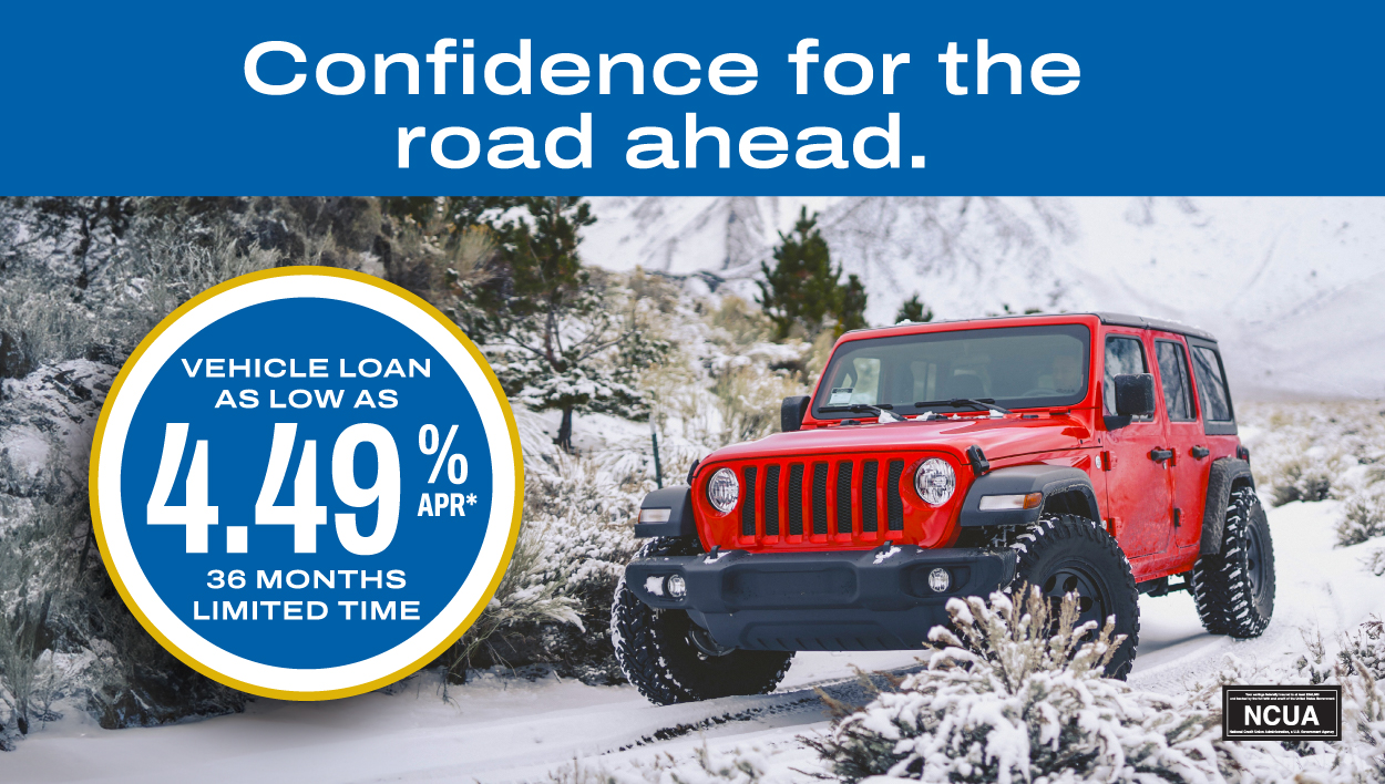 image A photo of a red car driving in the snow.